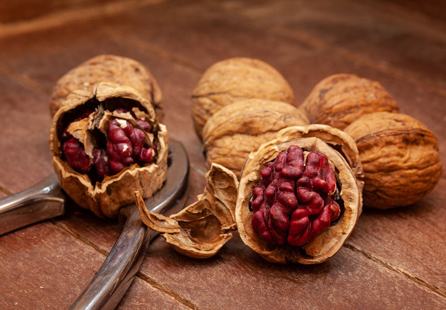 red-walnuts-in-cracked-shell